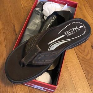 Brand new Flip flops by Rockport. Super soft